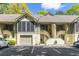 Charming condo with garage, stairs to entrance, neutral colors, and well maintained grounds at 220 Clubhouse Dr. # 20B, Sunset Beach, NC 28468