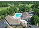 Aerial view of a large pool, jacuzzi and sundeck area at the community clubhouse at 220 Clubhouse Dr. # 20B, Sunset Beach, NC 28468