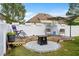 Backyard area with fire pit and white fence at 234 Belmonte Dr., Myrtle Beach, SC 29588