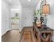 Bright hallway with wood flooring and decorative console table at 234 Belmonte Dr., Myrtle Beach, SC 29588