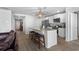 Open kitchen featuring white cabinets, stainless steel appliances, granite countertops and a breakfast bar with seating at 234 Belmonte Dr., Myrtle Beach, SC 29588