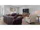 Cozy living room with comfortable seating, entertainment center, and natural light at 234 Belmonte Dr., Myrtle Beach, SC 29588