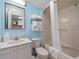 Well-lit bathroom with a vanity, toilet, and bathtub with shower at 2401 S Ocean Blvd. S # 1256, Myrtle Beach, SC 29577