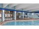 Relax in this spacious indoor pool area with lounge seating and easy access at 2401 S Ocean Blvd. S # 1256, Myrtle Beach, SC 29577