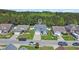 An inviting neighborhood aerial showcasing well-maintained homes and lush landscaping, creating a welcoming community at 254 Tall Palms Way, Little River, SC 29566