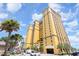 Attractive condominium building with covered parking and tropical landscaping, ideal for a resort lifestyle at 2600 N Ocean Blvd. # 1401, Myrtle Beach, SC 29577