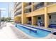 Unique lazy river winding through a resort property, providing a relaxing water experience for all ages at 2600 N Ocean Blvd. # 1401, Myrtle Beach, SC 29577