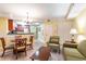 Inviting living area with dining set, comfortable seating, and open kitchen access at 2600 N Ocean Blvd. # 1401, Myrtle Beach, SC 29577