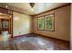 Bedroom with wood floors, painted walls and an open doorway to another room at 2865 N Nichols Hwy., Nichols, SC 29581