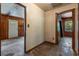 The hallway leads to the front door and into a room with natural light at 2865 N Nichols Hwy., Nichols, SC 29581