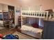 pink bedroom with bunkbeds and closet with bi-fold mirrored doors, plus ample lighting at 328 Harbour Reef Dr., Myrtle Beach, SC 29588