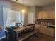 Eat-in kitchen and dining area, with stainless appliances, wood floors, and natural light at 328 Harbour Reef Dr., Myrtle Beach, SC 29588