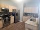 Bright kitchen with stainless steel appliances, granite countertops, and modern backsplash at 328 Harbour Reef Dr., Myrtle Beach, SC 29588