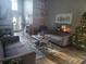Comfortable living area with sofas, a coffee table, and a decorative Christmas tree at 328 Harbour Reef Dr., Myrtle Beach, SC 29588
