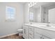 Bathroom features a double sink vanity, a toilet, and a shower with a glass door at 3336 Little Bay Dr., Conway, SC 29526