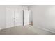 Bedroom with carpet, closet with folding doors and a white interior door at 3336 Little Bay Dr., Conway, SC 29526