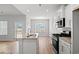Well-designed kitchen with granite counters, stainless steel appliances, and an adjacent dining area at 3336 Little Bay Dr., Conway, SC 29526