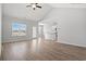 Spacious living room with a high ceiling, hardwood floors, ample natural light, and open floor plan at 3336 Little Bay Dr., Conway, SC 29526