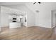 Bright living room with hardwood floors, open layout, recessed lighting, and vaulted ceiling at 3336 Little Bay Dr., Conway, SC 29526