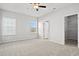 Bright and airy bedroom with two windows and a walk-in closet at 3336 Little Bay Dr., Conway, SC 29526