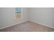 This carpeted bedroom with natural light offers a simple and clean space at 3339 Little Bay Dr., Conway, SC 29526