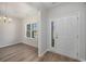Inviting foyer with wood flooring and plenty of natural light streaming through at 3339 Little Bay Dr., Conway, SC 29526