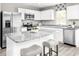 Modern kitchen featuring stainless steel appliances, granite countertops, and a spacious island with seating at 342 Myrtle Meadows Dr # 463F, Conway, SC 29526