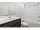 Clean bathroom features a tub shower, a wooden vanity, and a medicine cabinet mirror at 343 Barn Owl Way, Conway, SC 29527