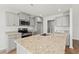 Modern kitchen with stainless steel appliances, granite countertops, and gray cabinets at 343 Barn Owl Way, Conway, SC 29527