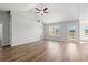 Spacious living room featuring vaulted ceiling, wood floors, neutral colors, and lots of natural light at 343 Barn Owl Way, Conway, SC 29527
