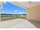 Covered patio overlooking the lawn and pond at 343 Barn Owl Way, Conway, SC 29527