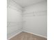 Walk-in closet with carpeted flooring and white shelving at 343 Barn Owl Way, Conway, SC 29527