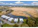 Stunning aerial view of waterfront homes surrounded by marsh and waterways, showcasing the area's natural beauty at 35 Red Skiff Ln. # 35, Pawleys Island, SC 29585