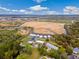 Gorgeous aerial view capturing a waterfront community nestled amidst serene marshlands and winding rivers at 35 Red Skiff Ln. # 35, Pawleys Island, SC 29585