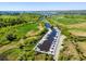 Aerial view of a marina surrounded by lush greenery and calm waters at 35 Red Skiff Ln. # 35, Pawleys Island, SC 29585