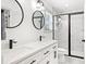 Bathroom with sleek fixtures, double sinks, and glass enclosed shower at 35 Red Skiff Ln. # 35, Pawleys Island, SC 29585