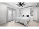 Guest bedroom features a queen size bed and built-in shelving at 35 Red Skiff Ln. # 35, Pawleys Island, SC 29585