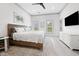 Bright bedroom with a large bed, ample natural light, and coastal decor at 35 Red Skiff Ln. # 35, Pawleys Island, SC 29585