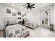 Guest bedroom with two twin beds, decor and a view to the neighborhood at 35 Red Skiff Ln. # 35, Pawleys Island, SC 29585