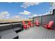 Inviting outdoor deck with ample seating overlooking tranquil marsh views, ideal for entertaining or relaxing at 35 Red Skiff Ln. # 35, Pawleys Island, SC 29585