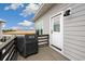 Outdoor deck area with grill perfect for entertaining with marsh views at 35 Red Skiff Ln. # 35, Pawleys Island, SC 29585