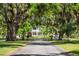 Charming home with a classic design nestled amidst lush greenery and mature trees at 35 Red Skiff Ln. # 35, Pawleys Island, SC 29585