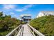 Beach house with easy access to the shore via a wooden walkway at 35 Red Skiff Ln. # 35, Pawleys Island, SC 29585