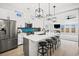 Spacious kitchen featuring stainless steel appliances, a large island, and bar stool seating at 35 Red Skiff Ln. # 35, Pawleys Island, SC 29585