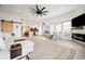 Open concept living room showcasing fireplace, dining area and kitchen at 35 Red Skiff Ln. # 35, Pawleys Island, SC 29585