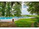 Inviting pool area with lounge chairs and well-manicured landscaping at 35 Red Skiff Ln. # 35, Pawleys Island, SC 29585