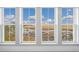 Stunning marsh views from these four large white-framed windows at 35 Red Skiff Ln. # 35, Pawleys Island, SC 29585