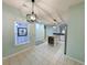 Dining room with stained glass window is open to an updated kitchen with breakfast bar at 400 Woodpecker Ln. # 17B, Murrells Inlet, SC 29576