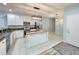Updated kitchen featuring white cabinets, stainless appliances, granite countertops, and a unique island at 400 Woodpecker Ln. # 17B, Murrells Inlet, SC 29576