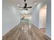 Open concept living space featuring durable flooring and open views to the kitchen at 400 Woodpecker Ln. # 17B, Murrells Inlet, SC 29576